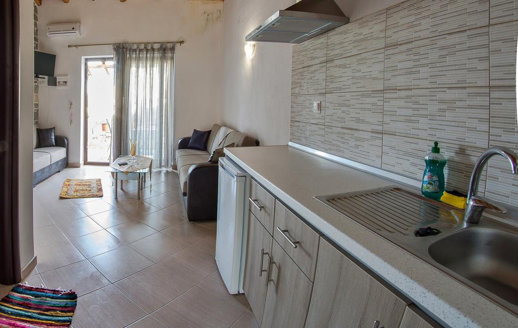 Theano Apartments Sarti Bagian luar foto